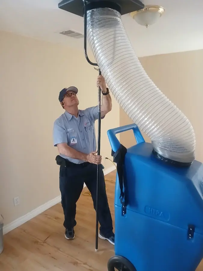 HVAC Installation technician using HEPA equipment in Corona